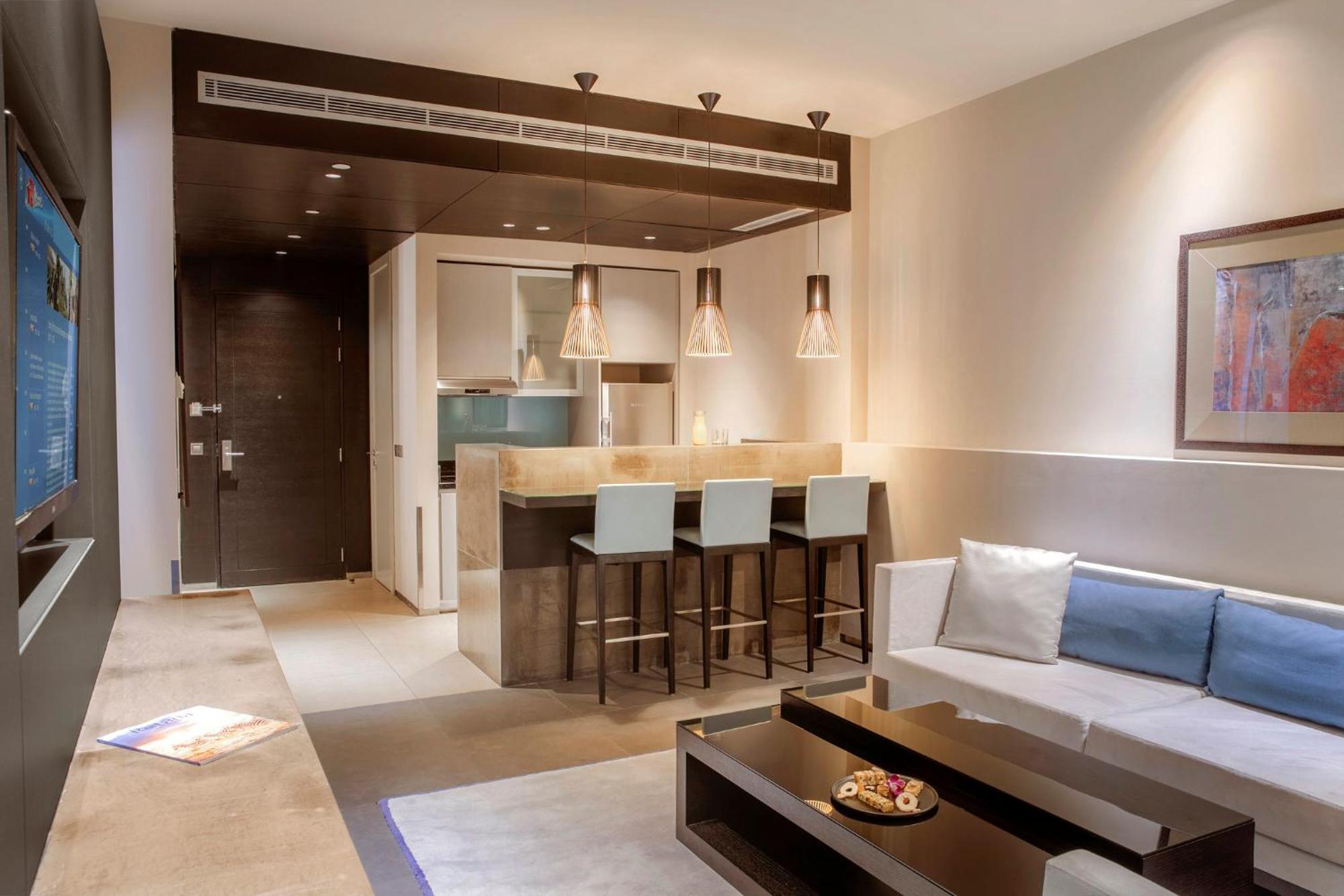 The Abdali Boulevard Hotel Amman Dış mekan fotoğraf A living room with a kitchenette